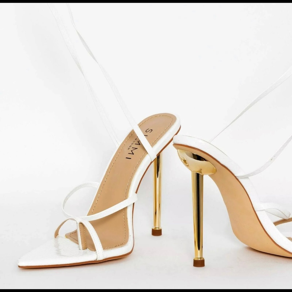 SIMMI LONDON Women's 'TYLER' White Snake LACE UP HEELS
I ordered a wrong size